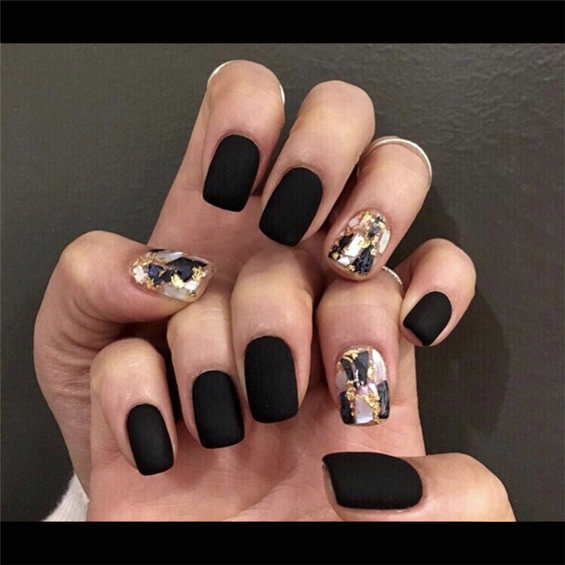 Wearing Black Frosted Shell Fake Nails – Elegant Matte Press-On Nails